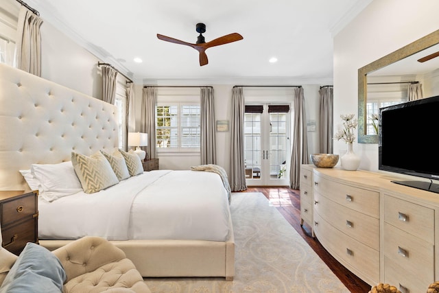 bedroom featuring crown molding, ceiling fan, wood-type flooring, and access to outside