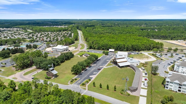 aerial view with a wooded view