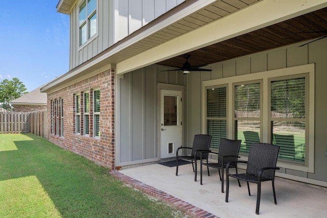 view of patio featuring visible vents, ceiling fan, and fence