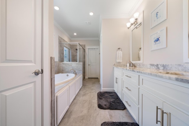 full bathroom with a shower stall, crown molding, baseboards, a bath, and vanity