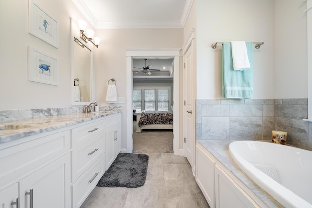 full bath with connected bathroom, crown molding, a washtub, double vanity, and a sink