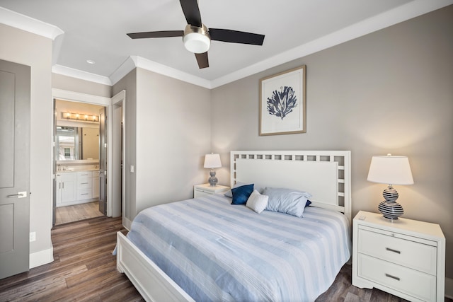 bedroom featuring crown molding, connected bathroom, ceiling fan, and dark hardwood / wood-style flooring