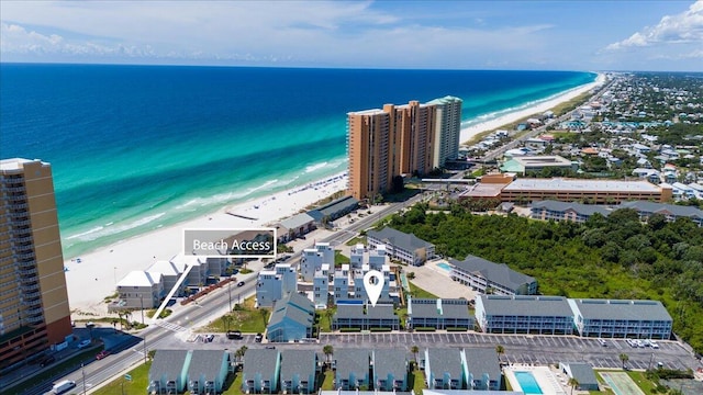 aerial view with a view of the beach and a water view