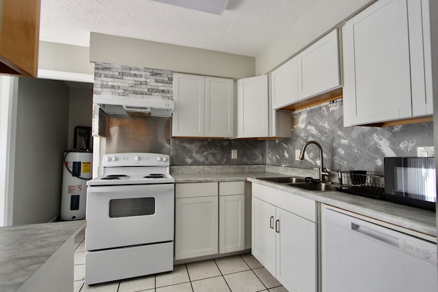 kitchen featuring light tile patterned floors, white appliances, sink, water heater, and white cabinetry