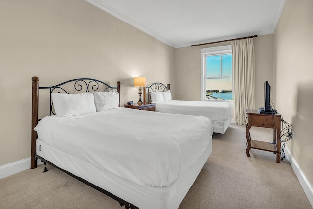 bedroom featuring light carpet and ornamental molding