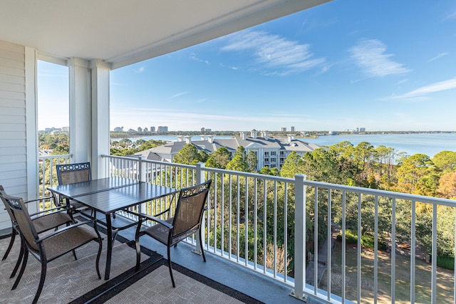 balcony featuring a water view