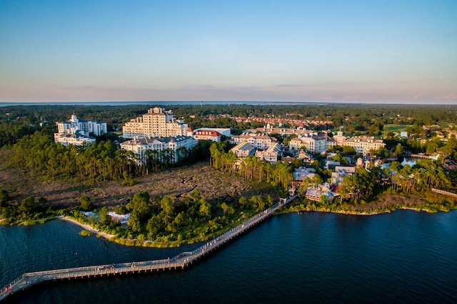 aerial view at dusk with a water view