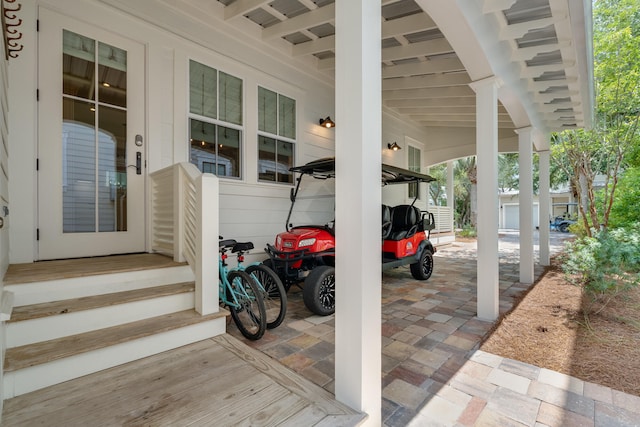 view of patio / terrace with a carport