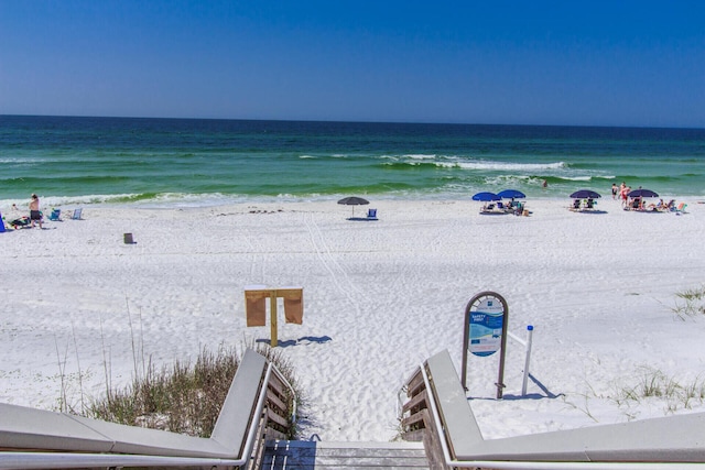 view of water feature with a beach view