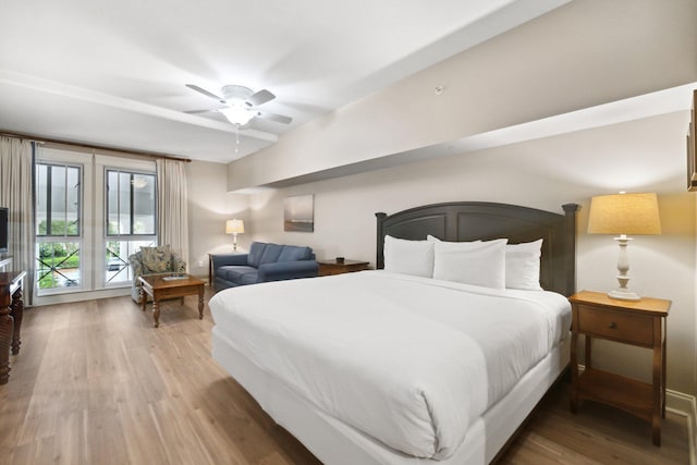 bedroom featuring hardwood / wood-style floors and ceiling fan