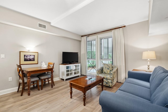 living room with light hardwood / wood-style floors