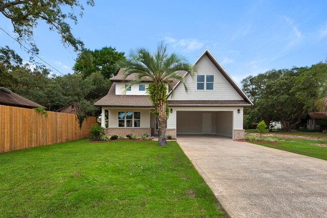 view of front facade featuring a garage and a front lawn