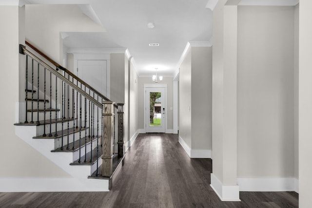 601 Third Ave, Destin, FL 32541 - entryway with visible vents, ornamental molding, wood finished floors, baseboards, and stairs