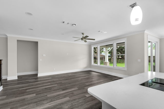 living room featuring ornamental molding, dark hardwood / wood-style flooring, and ceiling fan