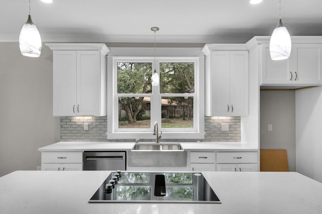 601 Third Ave, Destin, FL 32541 - kitchen with a sink, black electric stovetop, stainless steel dishwasher, and light countertops