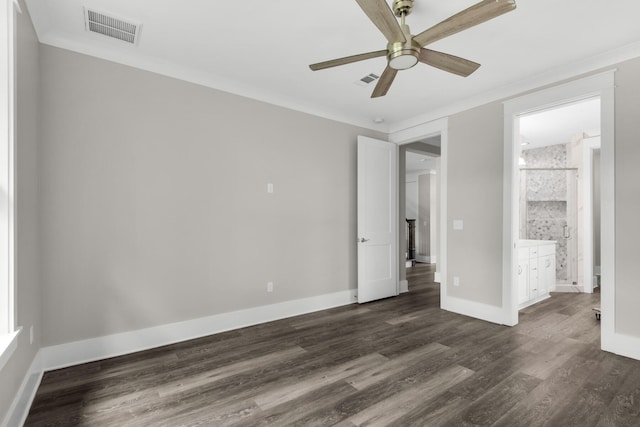 601 Third Ave, Destin, FL 32541 - unfurnished bedroom with dark wood finished floors, baseboards, visible vents, and ornamental molding