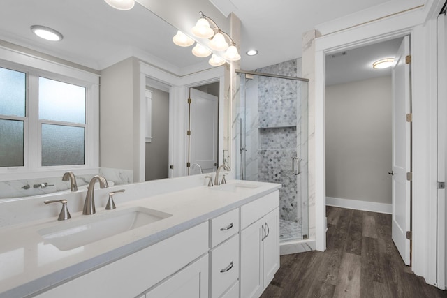 601 Third Ave, Destin, FL 32541 - bathroom with wood finished floors, a stall shower, and a sink