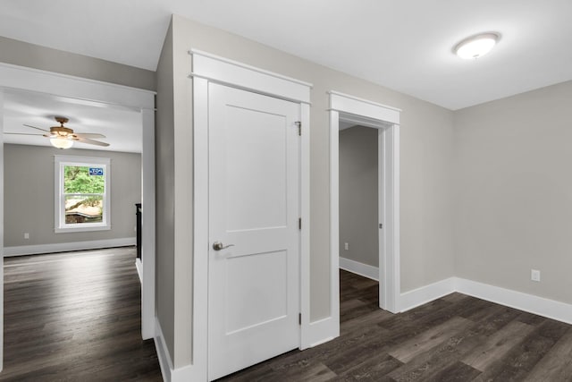 601 Third Ave, Destin, FL 32541 - empty room with baseboards, dark wood-style flooring, and ceiling fan