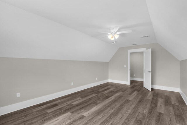 bonus room featuring lofted ceiling, ceiling fan, and dark hardwood / wood-style floors