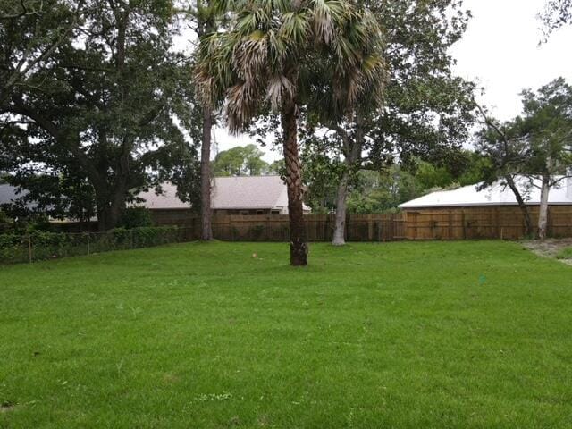 601 Third Ave, Destin, FL 32541 - view of yard with a fenced backyard