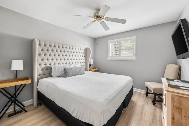 bedroom featuring ceiling fan and light wood-type flooring