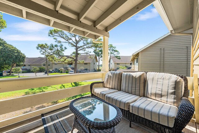 view of patio featuring a balcony