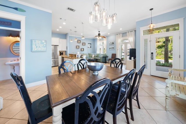 dining room featuring a ceiling fan, visible vents, baseboards, light tile patterned flooring, and recessed lighting