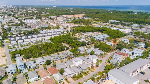 drone / aerial view with a residential view and a water view