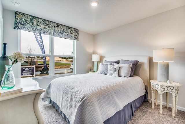 6324 Firefly Dr, Milton, FL 32583 - bedroom with carpet floors and baseboards