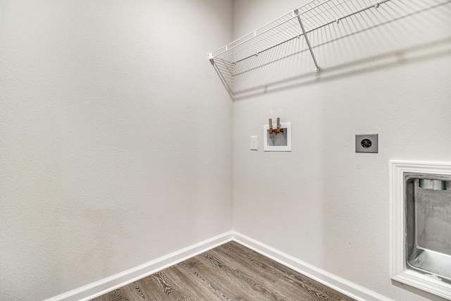 6324 Firefly Dr, Milton, FL 32583 - washroom with electric dryer hookup, washer hookup, dark wood-type flooring, and baseboards