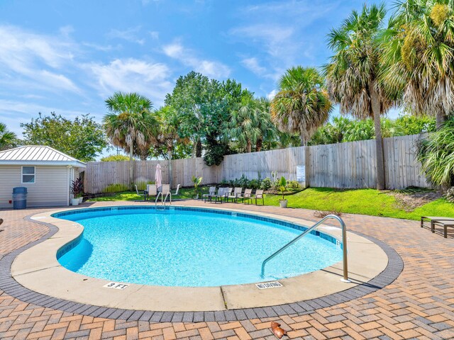 view of pool featuring a patio area