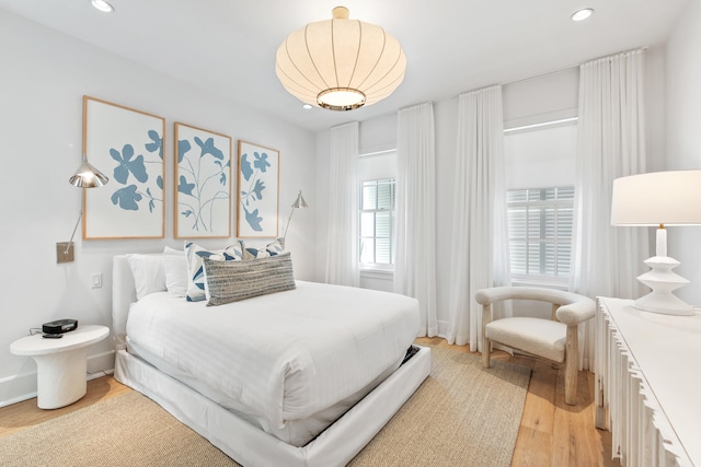 bedroom featuring light hardwood / wood-style floors