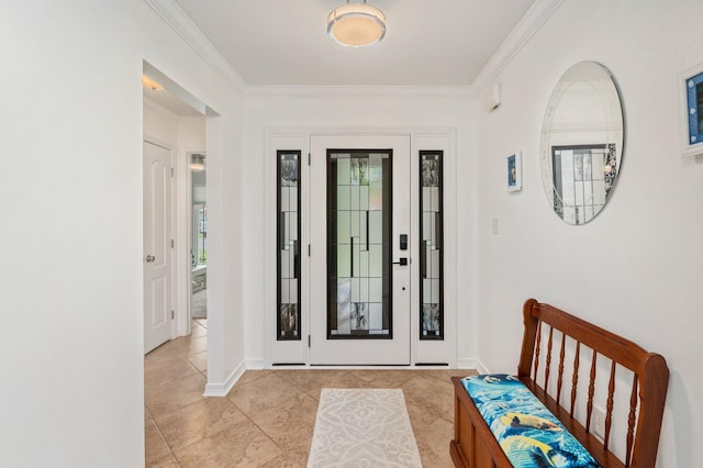 foyer entrance featuring crown molding