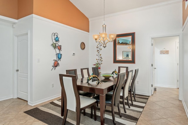 tiled dining space with an inviting chandelier, high vaulted ceiling, and ornamental molding