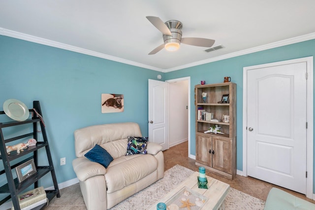 sitting room featuring ceiling fan, light tile patterned floors, and ornamental molding