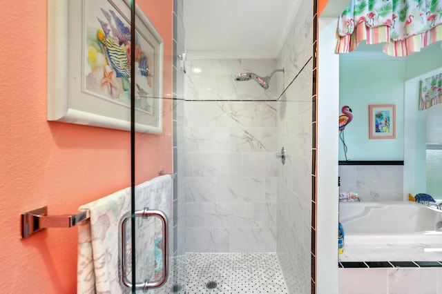 bathroom featuring a shower with door and ornamental molding