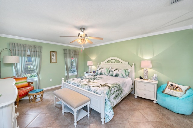 tiled bedroom with ceiling fan, a textured ceiling, and crown molding