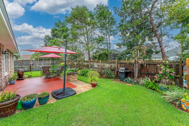 view of yard with a patio area