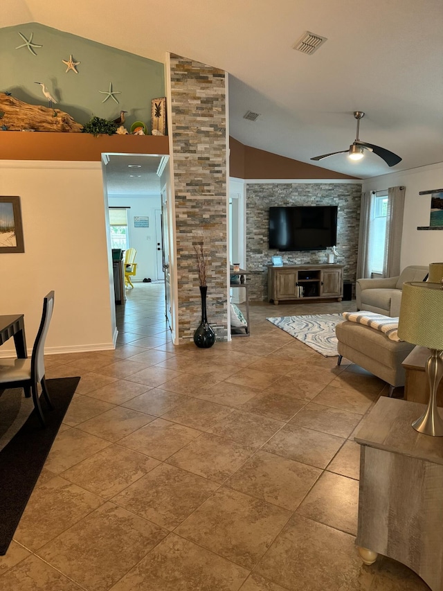 living room with lofted ceiling and ceiling fan