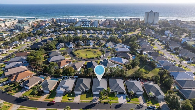 drone / aerial view with a view of the beach and a water view