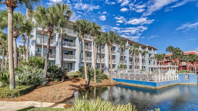 view of building exterior featuring a water view