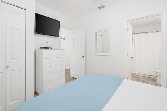 145 Spires Ln Unit 306, Santa Rosa Beach, FL 32459 - bedroom with light wood finished floors