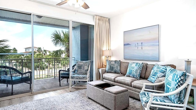 145 Spires Ln Unit 306, Santa Rosa Beach, FL 32459 - living room with wood finished floors, a ceiling fan, and plenty of natural light
