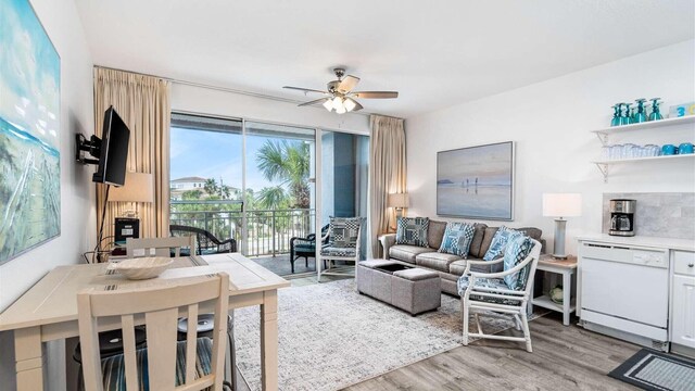 145 Spires Ln Unit 306, Santa Rosa Beach, FL 32459 - living area featuring ceiling fan and light wood-type flooring