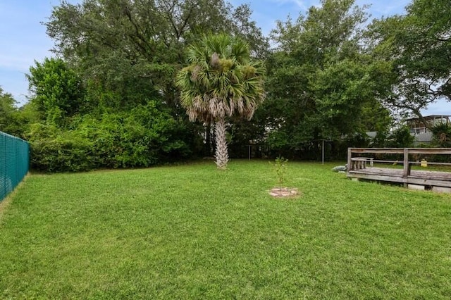 view of yard with fence