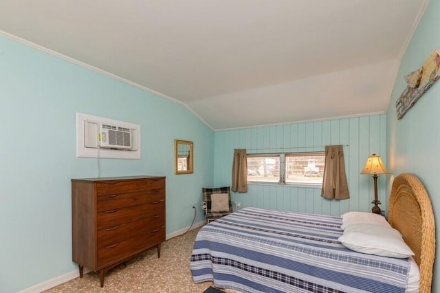 carpeted bedroom featuring vaulted ceiling, a wall unit AC, baseboards, and ornamental molding