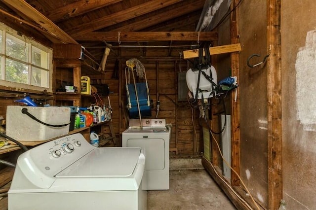 clothes washing area featuring laundry area and washing machine and clothes dryer