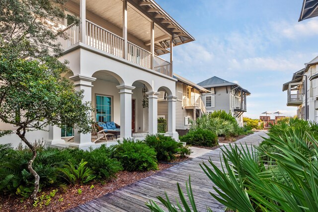 exterior space with a patio and a balcony