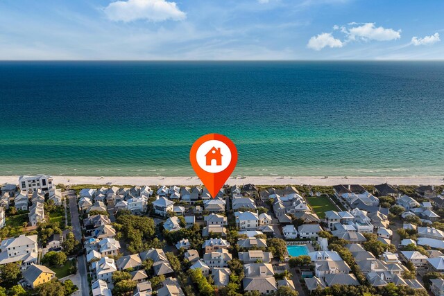 bird's eye view featuring a beach view and a water view