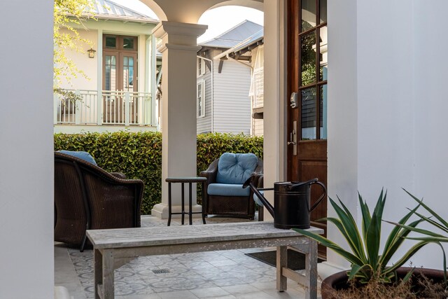 balcony featuring french doors